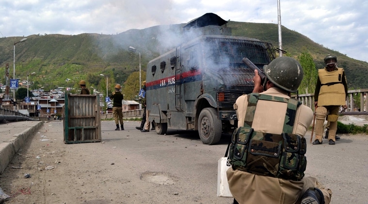 Police use tear gas shell during clashes in Baramulla over attacks on students in Kupwara district. (Source: Express photo by Shuaib Masoodi)