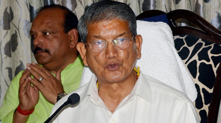 Dehradun: Former Uttarakhand chief minister Harish Rawat addressing a press conference in Dehradun on Wednesday. PTI Photo (PTI4_20_2016_000158A)