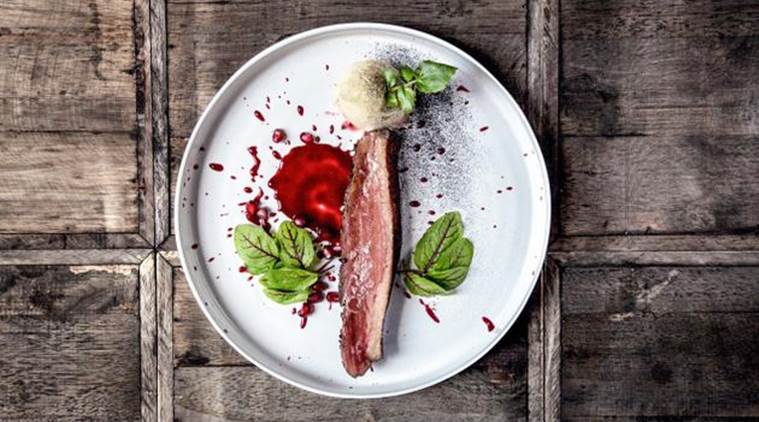 Hunting the Duck- grilled duck breast served with pomegranate sauce- at W Restaurant.