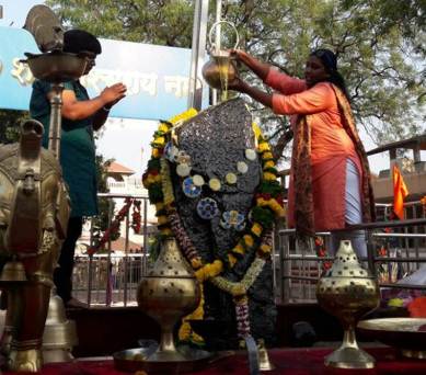 Breaking 400-year-old tradition, women enter Shani Shingnapur inner sanctum | India News,The Indian Express Breaking 400-year-old tradition, women enter Shani Shingnapur inner sanctum | India News,The Indian Express