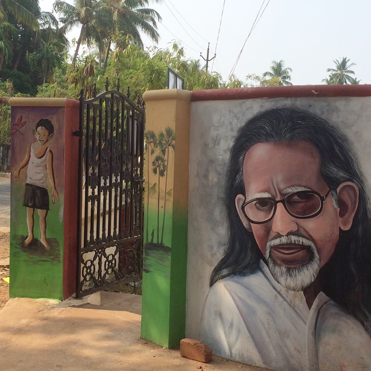 Murals at the entrance of the school ground where the play was staged.