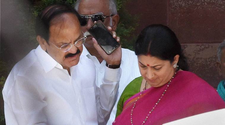 New Delhi: Union Parliamentary Affairs Minister Venkaiah Naidu and HRD Minister Smriti Irani . PTI Photo by Subhav Shukla(PTI4_13_2016_000056B)