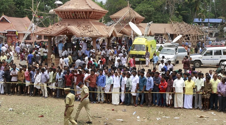 Policemen cordon off the area after a fire broke out at a temple in Kollam in the southern state of Kerala, India, April 10, 2016. A huge fire swept through a temple in India's southern Kerala state early on Sunday (April 10), killing nearly 80 people and injuring over 200 gathered for a fireworks display to mark the start of the local Hindu new year. REUTERS/Sivaram V