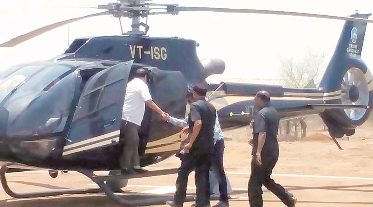 Eknath Khadse lands at the helipad in Belkund village on Friday. Express photo