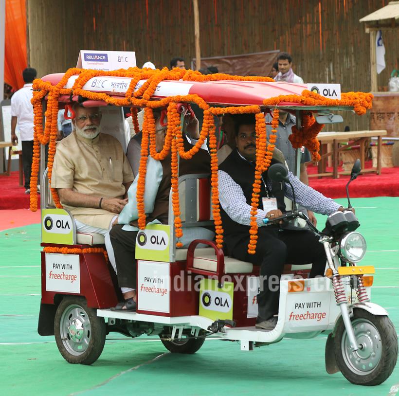 Narendra Modi, Narendra Modi e-rickshaw, Modi ride e-rickshaw, modi e-rickshaw ride, Stand up India, Stand India launch Pics, Narendra Modi pics, Modi pics, modi e-rickshaw pics, India news, Arun Jaitley, Jayant Sinha, Ram naik
