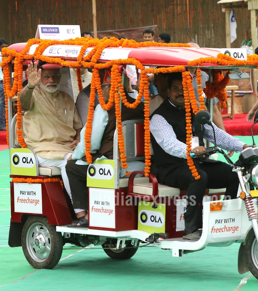 Narendra Modi, Narendra Modi e-rickshaw, Modi ride e-rickshaw, modi e-rickshaw ride, Stand up India, Stand India launch Pics, Narendra Modi pics, Modi pics, modi e-rickshaw pics, India news, Arun Jaitley, Jayant Sinha, Ram naik