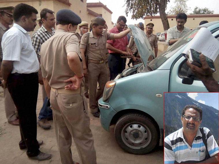 Bijnor: Police personnel checking the car of NIA officer Mohammed Tanzil (inset) who was shot dead by unidentified assailants on Saturday night as he was on his way back from a function with his wife and two children, in Bijnor on Sunday. PTI Photo(PTI4_3_2016_000256B)