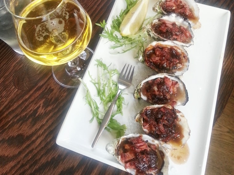 Shell-ing point: Oysters Kilpatrick. (Photo: Bijoy Venugopal)