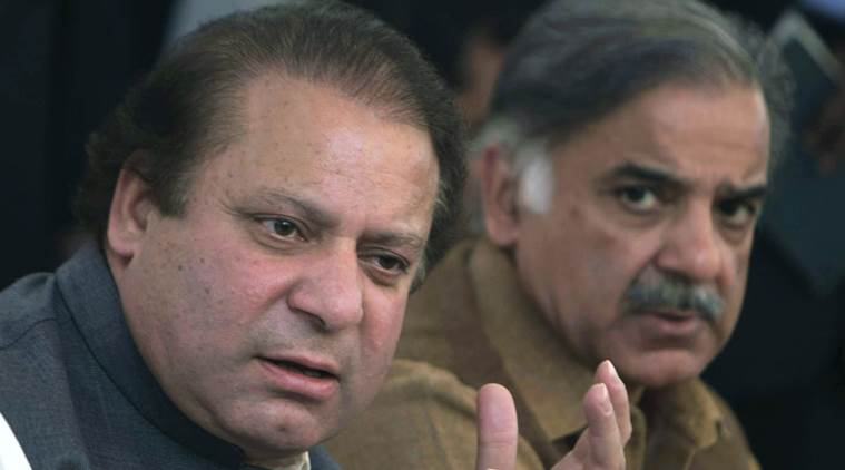 FILE - In this Feb. 17, 2008 file photo, Pakistan's Prime Minister Nawaz Sharif, left, and his brother Shahbaz Sharif address a news conference in Lahore, Pakistan. Sharif has announced that he will set up an independent judicial commission to probe whether his family is involved in illegal overseas investments after reports based on documents leaked from a Panama-based law firm indicated his sons owned several offshore companies. (AP Photo/KM Chaudary,File)