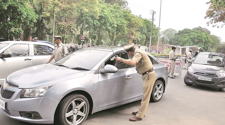 Checking of outsiders vehicles at Panjab University Chandigarh on Monday, April 18 2016. Express Photo by Sahil Walia