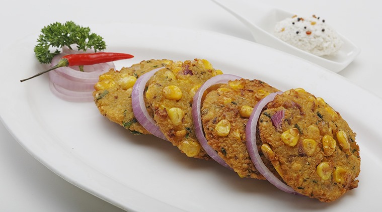 The Vishu sadya spread is available for both lunch and dinner and includes delicacies such as the Parippu Vada or dal fritters.
