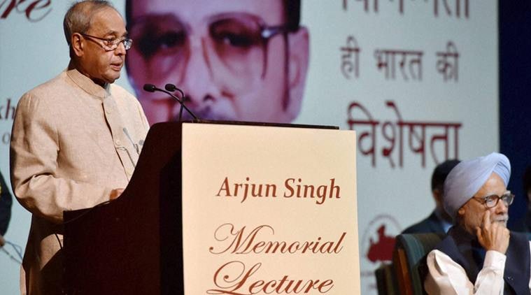 New Delhi: President Pranab Mukherjee delivering the 1st Arjun Singh Memorial Lecture organized by the Arjun Singh Sadbhavna Foundation in New Delhi on Saturday. Former Prime Minister Manmohan Singh is also seen. PTI Photo by Vijay Verma (PTI4_9_2016_000147B)