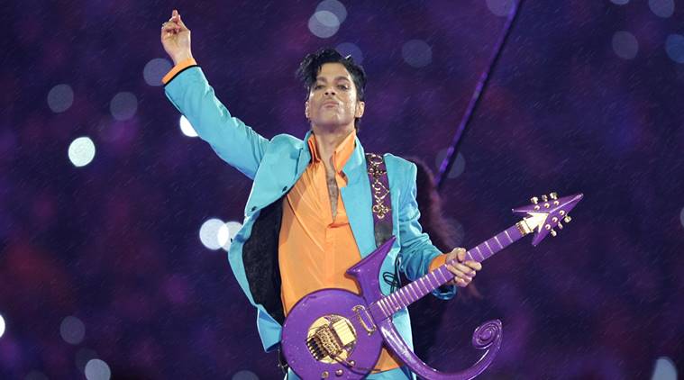 FILE - In this Feb. 4, 2007 file photo, Prince performs during the halftime show at the Super Bowl XLI football game at Dolphin Stadium in Miami. Prince, widely acclaimed as one of the most inventive and influential musicians of his era with hits including "Little Red Corvette," ''Let's Go Crazy" and "When Doves Cry," was found dead at his home on Thursday, April 21, 2016, in suburban Minneapolis, according to his publicist. He was 57. (AP Photo/Chris O'Meara, File)