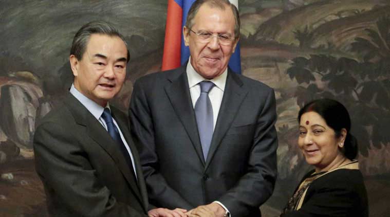 From left: Chinese Foreign Minister Wang Yi, Russia Foreign Minister Sergey Lavrov and Indian Foreign Minister Sushma Swaraj shake hands after a meeting in Moscow, Russia, Monday, April 18, 2016. (Source: AP)