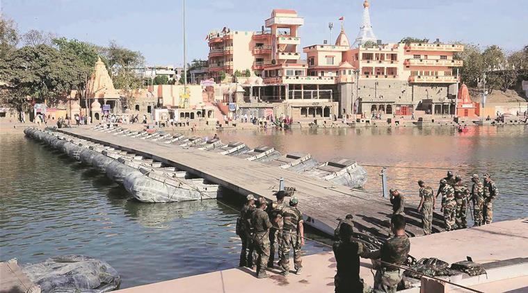 Ujjain: Army personnel prepare a pontoon bridge at the banks of holy river of Kshipra as a part of preparations for Simhastha Maha Kumbh in Ujjain on Wednesday. PTI Photo(PTI4_6_2016_000200B)