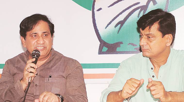 Congress National General Seceretary Shakeel Ahmad along with party's state President Nirmal Khatri hold a press c onference at state party head office in Lucknow on thursday.Express photo by Vishal Srivastav 26.05.2016