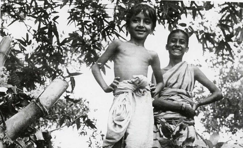 A photograph of actors Subir Banerjee and Uma Dasgupta in the middle of the shoot.