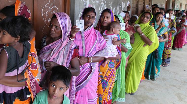 Voters stand outside sonachura K C A Milan Vidya Mandir polling booth at Sonachura , Nandigram , East Midnapore. Polling held for 25 constituencies of East Midnapore (16 constituency) and Coachbehar (9 constituency) districts, in the final phase of West Bengal state assembly election on Thursday, May 05, 2016. Express photo by Partha Paul