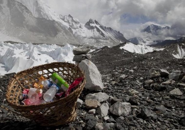 Rubbish collected at Everest base camp with the Himalayan range seen at the background in Nepal, May 03, 2011. REUTERS/Laurence Tan/Files