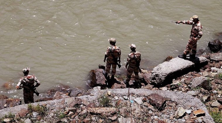ITBP jawans carry out a rescue operation in Beas River near Pandoh Dam in Mandi a day after 24 engineering students from Hyderabad were washed away in the River near Thalot following discharge of water from Larji Dam. (Source: PTI/FILE)