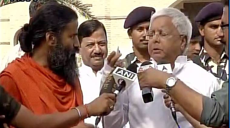 Ramdev Baba, Lalu Prasad Yadav, Ramdev baba rubbing cream on Lalu, India news