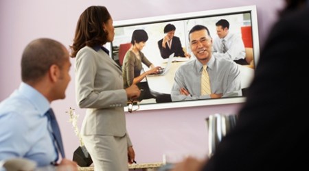 Multi-ethnic businesspeople having video conference