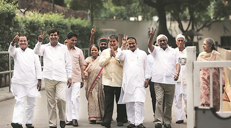 Uttaranchal CM Harish Rawat with his close aides leave the residence of the Congress President Sonia Gandhi after meeting her in the capital New Delhi on thursday. Express Photo by Tashi Tobgyal New Delhi 120516