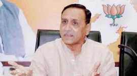 vijay rupani, aap, bjp, aam aadmi party, gujarat, gujarat government, aap delhi, bjp gujarat, aap gujarat, aap protest, bjp government, bjp aap, gujarat news, india news