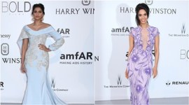 sonam kapoor, cannes, cannes film festival, amfar gala, amfar, mallika sherawat, sonam kapoor pics, sonam kapoor cannes pics, sonam kapoor amfar gala pics, sonam kapoor amfar pics, sonam kapoor pics from cannes, sonam kapoor cannes dress, mallika sherawat cannes, aishwarya rai bachchan, mallika sherawat amfar gala, mallika sherawat amfar, mallika sherawat amfar pics, entertainment news, bollywood at cannes, entertainment