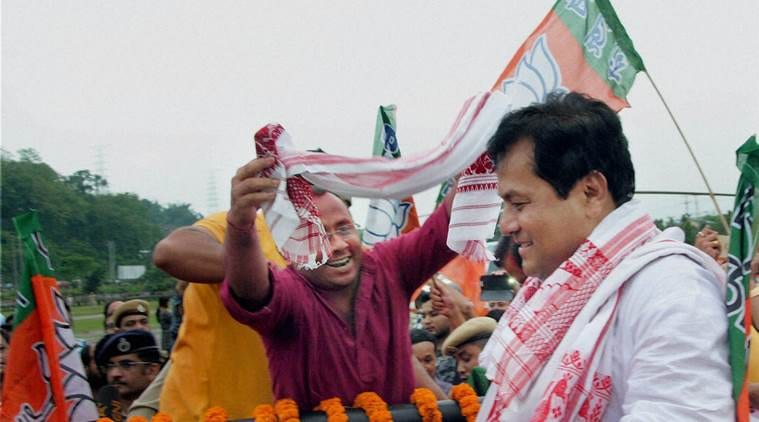 Guwahati: BJP chief ministerial candidate Sarbananda Sonowal at a victory procession after the party's thumping win the Assam Assembly polls, in Guwahati on Thursday. PTI Photo (PTI5_19_2016_000302B)