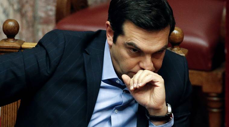 Greek Prime Minister Alexis Tsipras attends a parliamentary session before a vote of tax and pension reforms in Athens, Greece, May 8, 2016. REUTERS/Alkis Konstantinidis     TPX IMAGES OF THE DAY