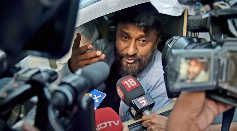 Kolkata: Film director Vivek Agnihotri interacts with the media after his car was stopped by the students at the entrance of Jadavpur University campus for screening of his film 'Buddha in a Traffic Jam' in Kolkata on Friday. PTI