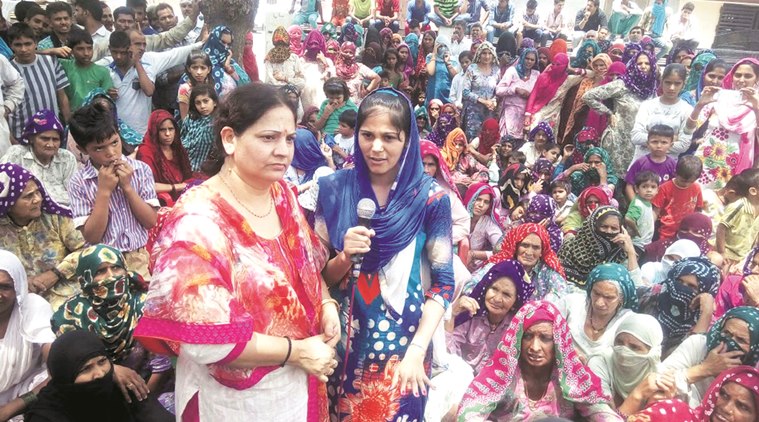 The women’s wing of Sarv Jatiya Sarv Khap mahapanchayat at a meeting in Manas village of Kaithal on Sunday. Express Photo