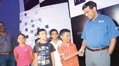 Rameshbabu Praggnanandhaa with Viswanathan Anand. Rameshbabu