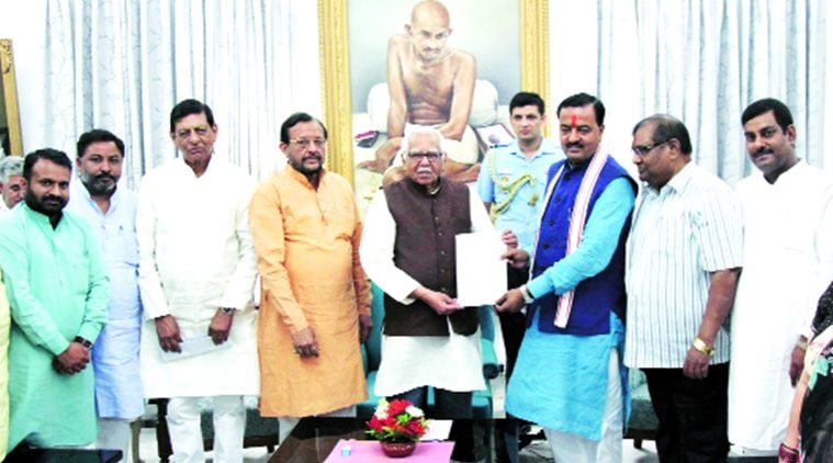 BJP leaders hand over the Kairana probe report to Governor Ram Naik, in Lucknow Friday. Vishal Srivastav 