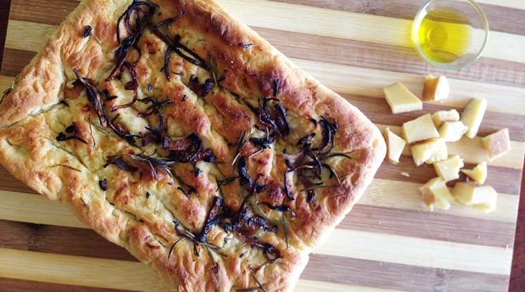 You can use any kind of toppings when you bake this bread including fried onions and sundried tomatoes. (Photo: Bijal Vachharajani)