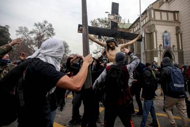 Chile, Catholic Church, Chile Catholic church, catholic church in chile, chile churches, chile church, chile religion, chile crimes, chile student march, student march in chile, chile central university, hooded vandals raid, Chila hooded vandals, chile news, chile crime news, crime news, world news, latest news
