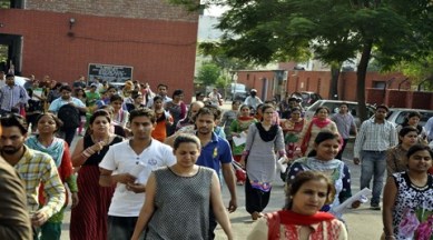 Candidates after exam of UGC at Government Model Senior Secondary School in Sector 16 of Chandigarh on Sunday, June 28 2015. Express Photo by Sahil Walia