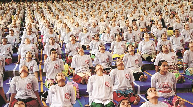 Pregnant women perform yoga in Rajkot on Tuesday, to mark International Yoga Day. PTI photo