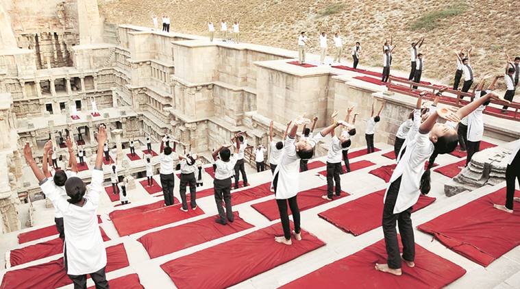 international yoga day, yoga day, rajkot yoga day, guinness world record, gujarat yoga day, yoga day in gujarat, narendra modi, indian express yoga day, indian express news, india news