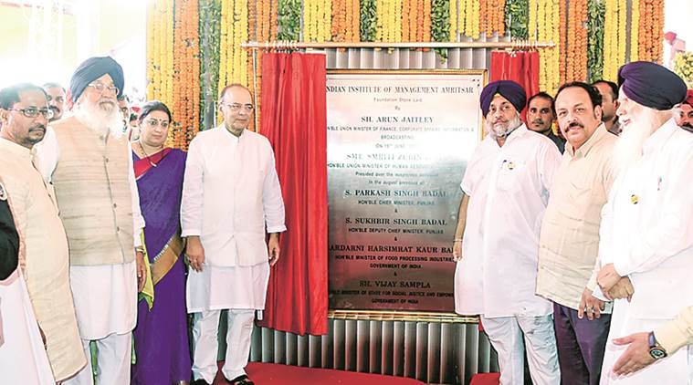 CAPTION- Union Finance Minister Arun Jaitley,Human Resource Development (HRD) Minister Smriti Irani ,Punjab Chief Minster Parkash Singh Badal ,Union Cabinet Minister of Food Processing Harsimrat Kaur Badal and Deputy Chief Minister Sukhbir Singh Badal during the laying foundation stone of the Indian Institute of Management (IIM) in Manawala near Amritsar on Sunday, June 19 2016.EXPRESS PHOTO BY RANA SIMRANJIT SINGH