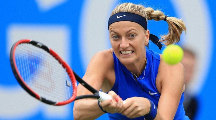 Birmingham : Czech Republic's Petra Kvitova plays a return fellow countrywoman Lucie Safarova during day two of the Birmingham Classic women's tennis tournament at the Edgbaston Priory, Birmingham. central England Tuesday June 14, 2016. AP/PTI(AP6_14_2016_000175B)