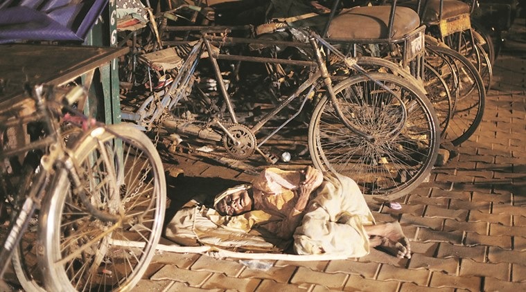 95 year old Goba Devi sleeps on the footpath after her grandson rescued her from Jawaharbagh following the clash between encroachers and police. Express photo by Oinam Anand. 04 May 2016