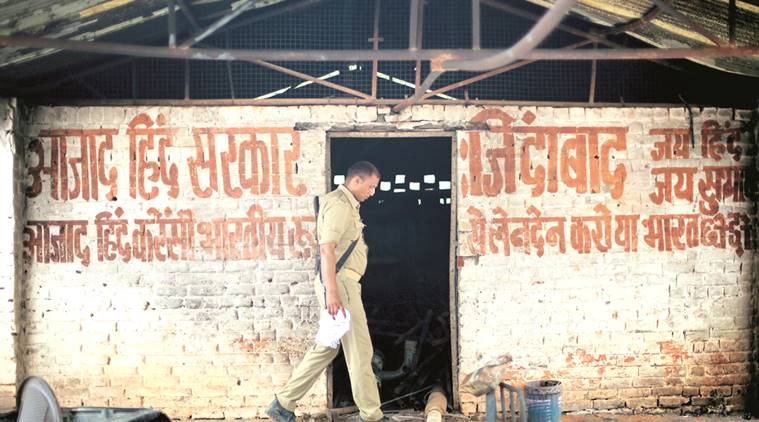 A policeman patrolling inside the Jawahar Bagh, Mathura on Sunday. Express photo by Oinam Anand. 05 June 2016