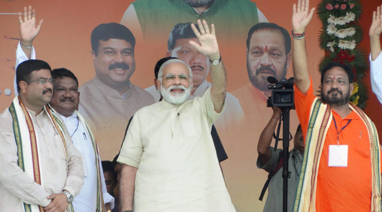 Prime Minister Narendra Modi waves during Vikas Parv rally in Balasore on Thursday. (Source: PTI)
