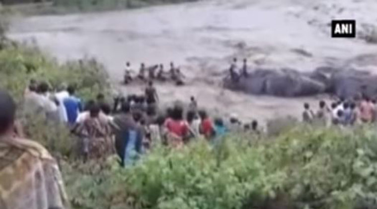 odisha, drowning, jhanjabati river, jhanjhabati river, odisha river, odish drowning viral video, youth save children drowning, odisha news, india news, latest news