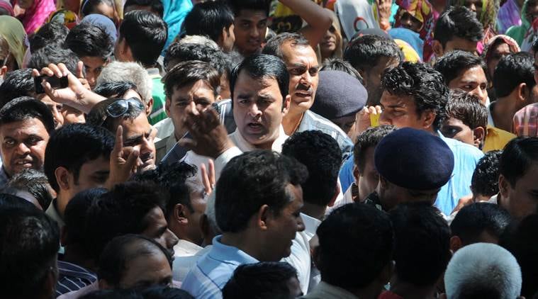 BJP MLA Sangeet som visits in bisada village of Dadri and held a meeting with villager, where a Muslim man was lynched by a mob. Express Photo by Gajendra Yadav