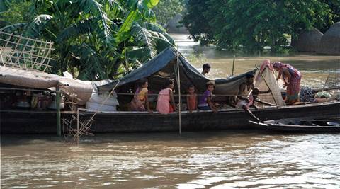Heavy rain, floods throw normal life out of gear in Assam, Bihar ...
