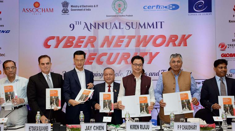 New Delhi: Kiren Rijiju, Minister of State for Home Affairs and P.P. Chaudhary, Minister of State for Electronics and IT releasing the ASSOCHAM-PwC Study Paper titled Protecting interconnected systems in the cyber era at ASSOCHAM's 9th Annual Summit on Cyber & Network Security in New Delhi Friday. PTI Photo (PTI7_29_2016_000139A)