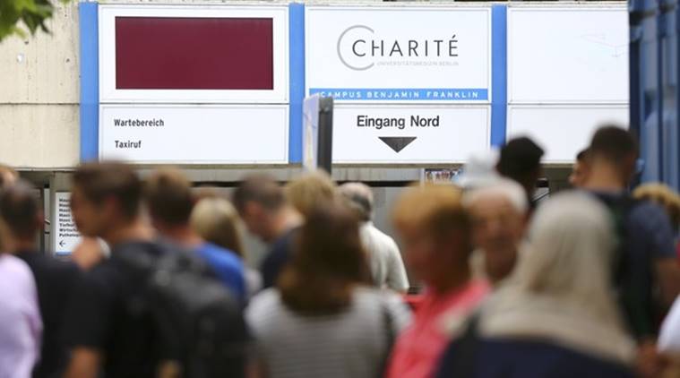 People wait outside the university clinic in Steglitz, a southwestern district of Berlin, July 26, 2016 after a doctor had been shot at and the gunman had killed himself. (Source: Reuters photo)